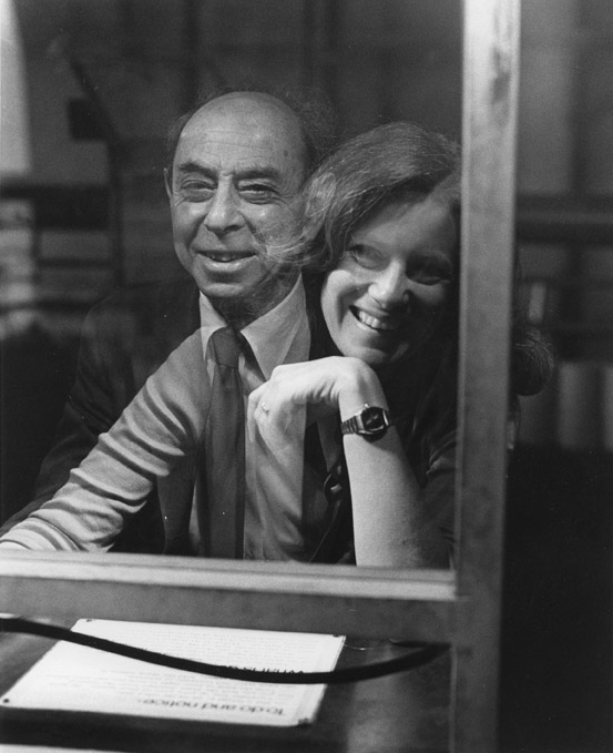 Playing with physics A photo shows the reflection of a woman laughing next to the image of a smiling man who sits opposite to her as they interact with an exhibit that takes advantage of changing light levels and a kind of two-way mirror.