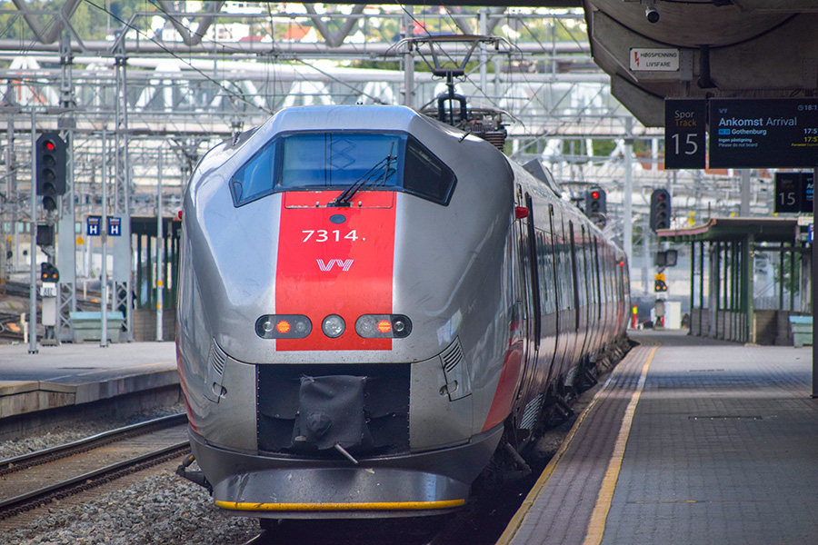 Train Photograph of a train standing in a station.